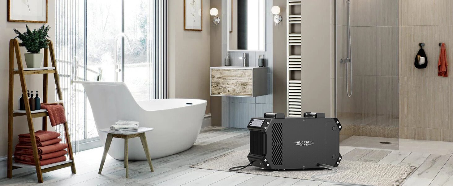 AlorAir Galaxy 60 dehumidifier positioned in a bathroom to reduce condensation and moisture near the shower