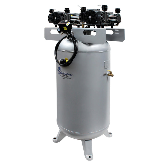 Angled view of oil-free ultra quiet air compressor showing dual motor setup and steel tank design