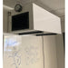 BSE AIRPRO Carbon 1100 CFM Commercial Ambient Air Cleaner installed in an office setting, mounted above a whiteboard.