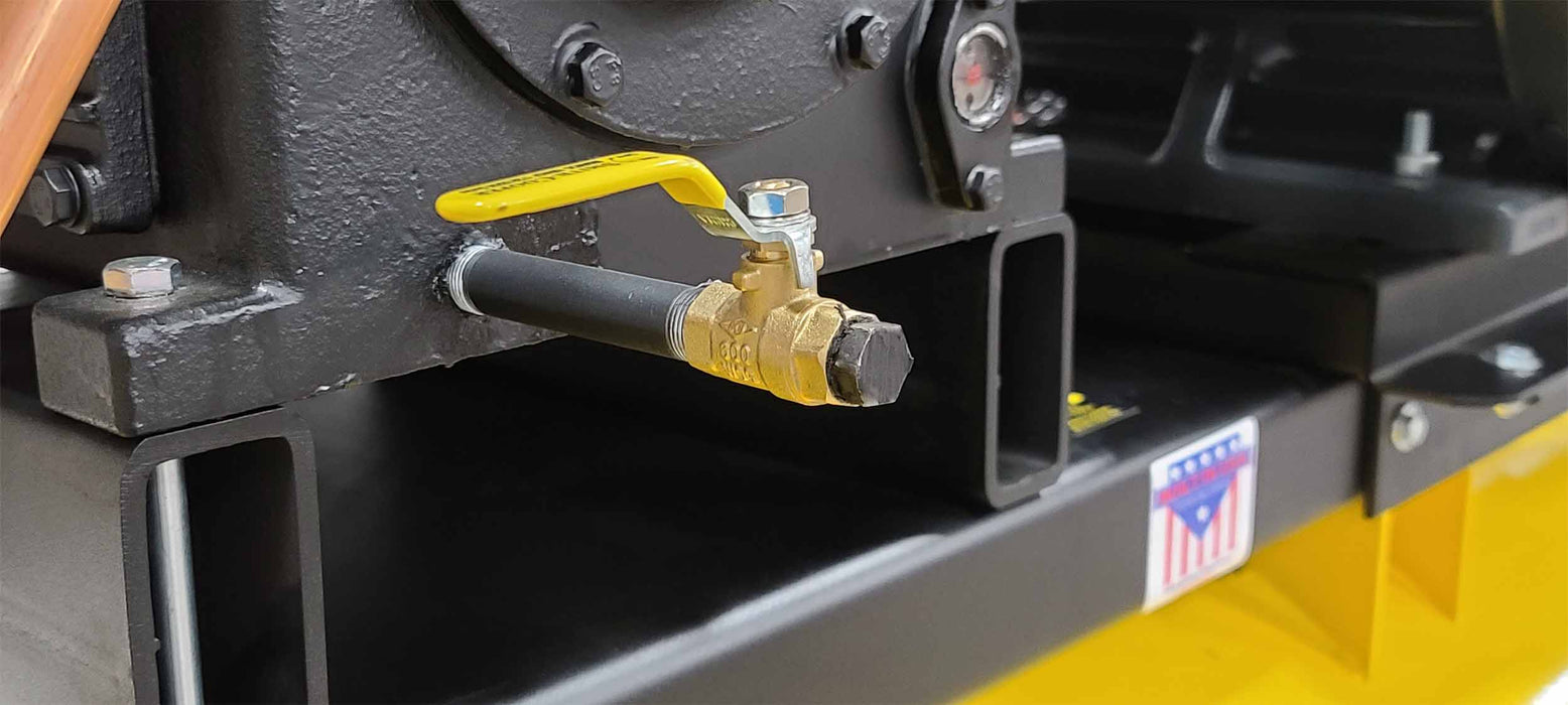 Piping and valve detail of the EMAX E450 25 HP Air Compressor, highlighting the robust brass fittings and the quality of the components