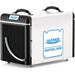 Side angle view of the AlorAir Sentinel HDi90 dehumidifier showing coil ventilation and drain hose connection