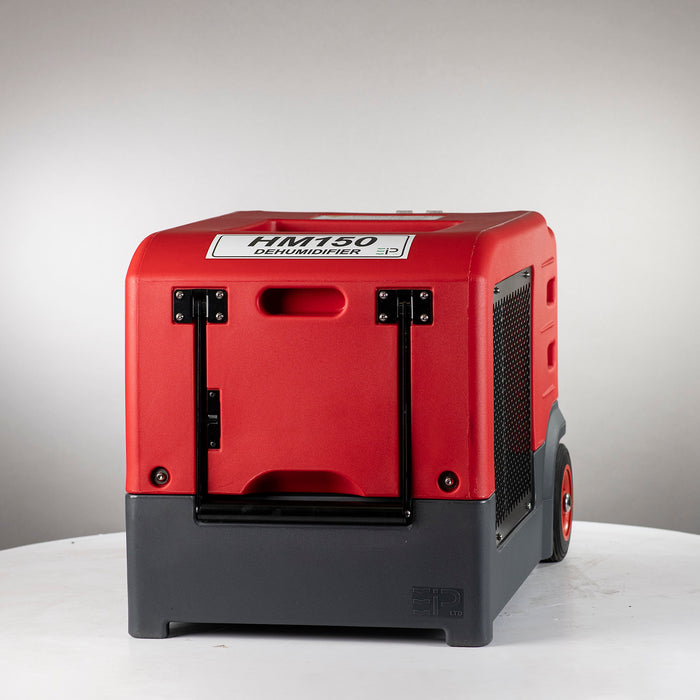 Front view of EBac HM150 industrial dehumidifier showing red rotomolded housing and integrated carry handle.