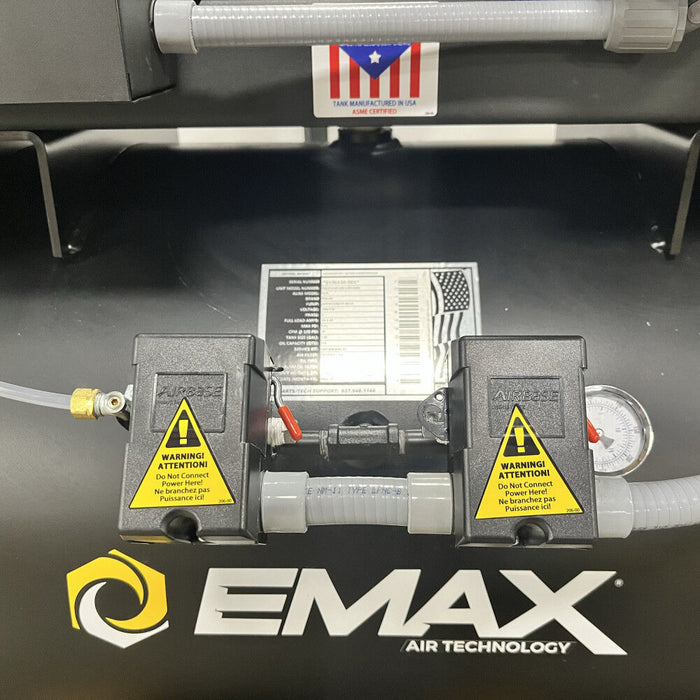 Detail of control components and air lines on EMAX E450-DR Series alternating duplex piston air compressor