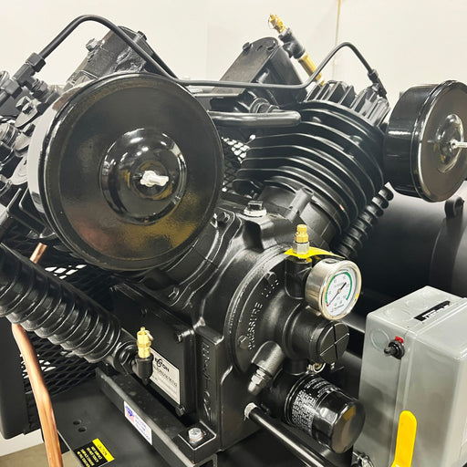 Close up of pressure lubricated piston pump on EMAX E450 SD silent air duplex compressor