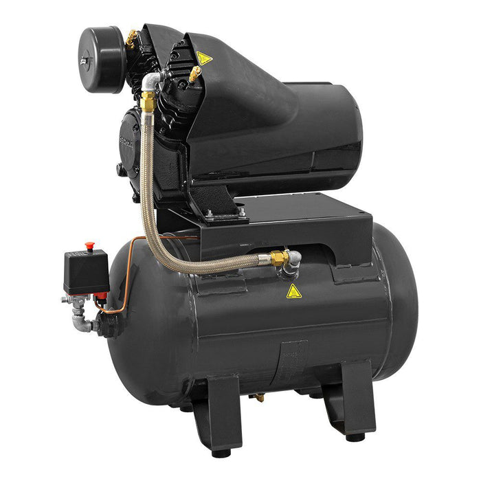 Rear angle view of Schulz Audaz two stage direct coupling air compressor with piping