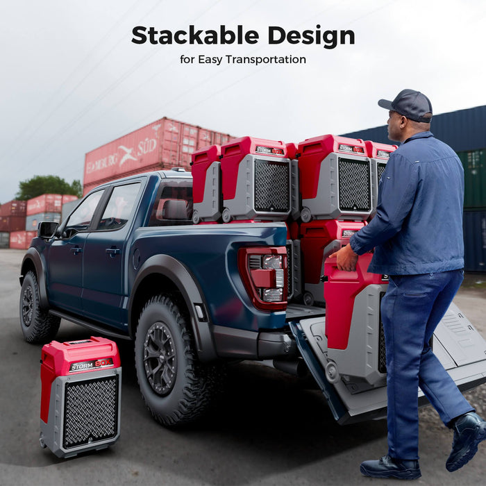 AlorAir Storm 80X dehumidifiers stacked and loaded into a pickup truck bed for job site transportation