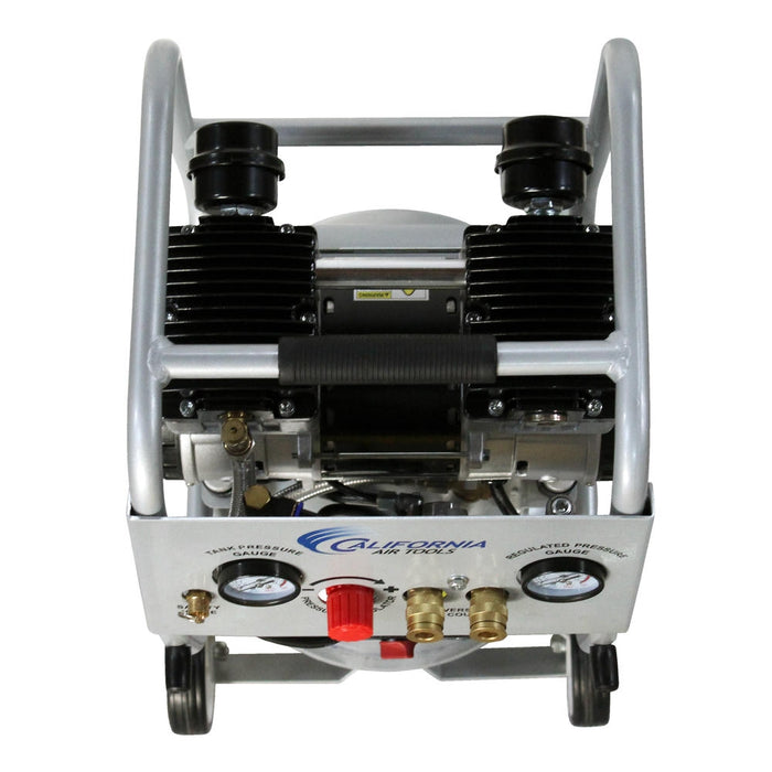 Top view of California Air Tools air compressor control panel with dual pressure gauges, regulator knob, and quick connect couplers