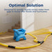 AlorAir X-Force blower positioned near a basement staircase running yellow hose lines through a floor vent, the optimal solution after floods and hurricanes